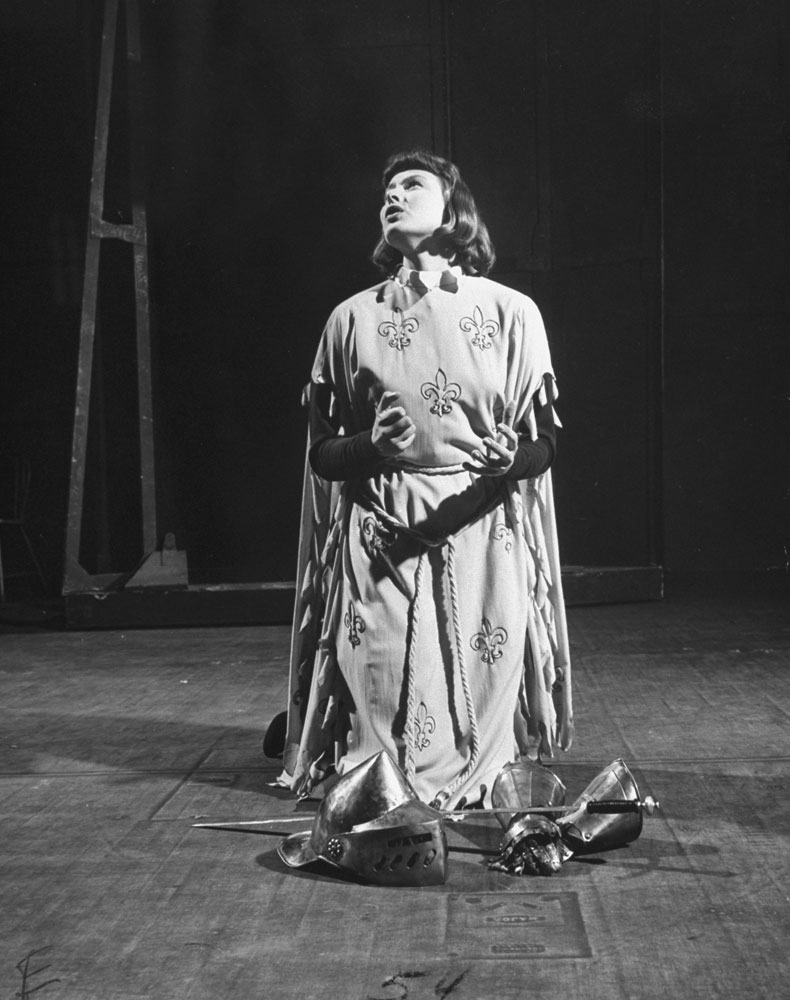 Ingrid Bergman as Joan of Arc praying for guidance during a scene from the Broadway production of Maxwell Anderson's 1946 play, Joan of Lorraine, for which Bergman won a Tony. I